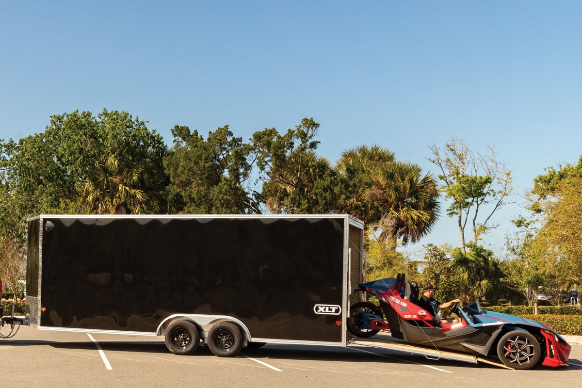 Car loading into black XLT Pro car hauler
