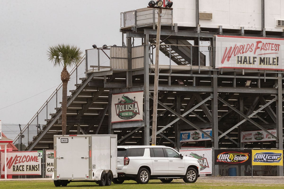 White XLT Pro 7 Wide parked in front of stadium